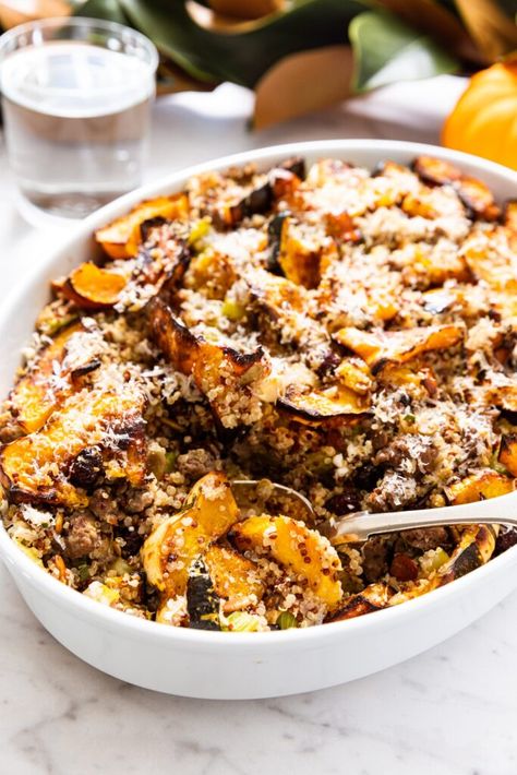 Rather than stuffing all the components that traditionally go into stuffed acorn squash, this recipe achieves the best of both worlds. A combination of quinoa, sausage, cranberries, and cheese are combined with chunks of acorn squash to create the perfect casserole. It’s perfect for any fall day and special enough for the Thanksgiving table! | wyseguide.com #Thanksgiving #sidedish #squash #recipe Acorn Squash Thanksgiving, Meal With Sausage, Acorn Squash Casserole, Squash Thanksgiving, Dumpling Squash, Side Dish For Thanksgiving, Wyse Guide, Twice Baked Sweet Potatoes, Squash Casserole Recipes