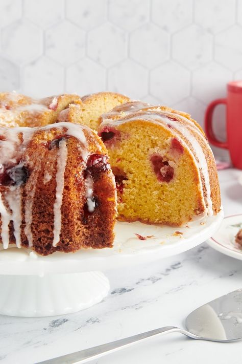 This festive Cranberry Bundt Cake is full of great flavor perfect for the season. The cranberries add a bit of tartness to this sweet cake that's flavored with a little fresh orange juice and zest. Cranberry Orange Pound Cake, Cranberry Bundt Cake, Cranberry Orange Bundt Cake, Cranberry Orange Cake, Holiday Recipies, Orange Bundt Cake, Orange Pound Cake, Easy Cakes To Make, Cranberry Cake