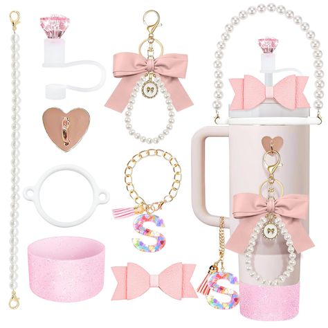 PRICES MAY VARY. CHARMING STANLEY CUP ACCESSORIES:Beautify your Stanley cup with a pink Stanley accessories set. From school to outings, you'll receive countless compliments while enjoying your favorite beverage. COMPLETE ACCESSORY SET: Includes 8 pieces - water bottle handle strap, silicone ring, silicone straw topper, Stanley cup boot, bow straw decoration, Stanley cup letter charms for handle, bow keychain, and heart hook. (Cup not included) HIGH-QUALITY MATERIAL: Made of durable and exquisit Stanley Cup Accessories Ideas, Pink Stanley Cup, Pink Stanley, Stanley Accessories, Bow Keychain, Straw Decorations, Straw Cover, Cup Accessories, 40 Oz Tumbler