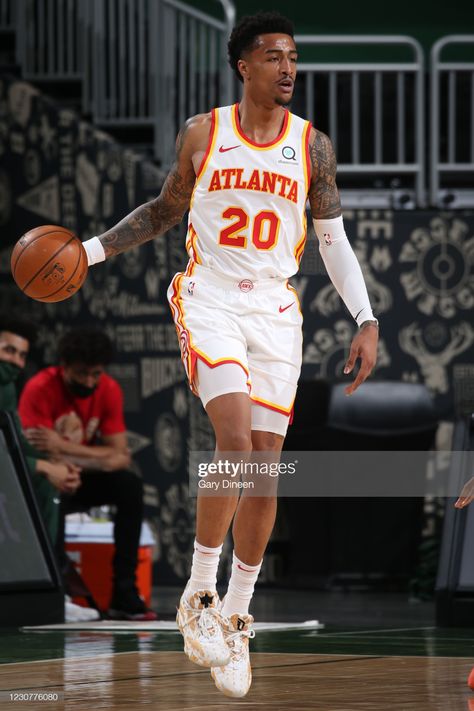 News Photo : John Collins of the Atlanta Hawks dribbles the... Hawks Basketball, John Collins, Trae Young, Nba Wallpapers, Nba Logo, Basketball Star, Milwaukee Wisconsin, Atlanta Hawks, Milwaukee Bucks