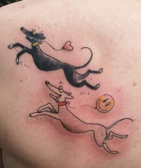 Two greyhounds, one black and one white, in the style of Rich Skipworth's cartoons, cavorting on a shoulder blade, coloured to look like the owner's passed greyhounds. Yellow smiley face balloon floating from the white greyhound's collar and pink heart balloon floating attached to the black greyhound's collar. Sighthound Tattoo, Greyhound Tattoo, Long Face, Long Faces, Greyhound, I Tattoo, Tatting, Tattoo Ideas, Tattoos