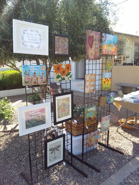 2 grids 6' tall, canvas display at craft show.  www.serendipitystudiobycw.blogspot.com Craft Show Canvas Display, Art Show Display Ideas Paintings, Canvas Art Display Booth, Displaying Canvas Art At Craft Show, Grid Display Ideas Craft Fairs, Craft Fair Displays For Wall Art, Craft Show Painting Display, Art Display Table, How To Display Canvas Art At Craft Show