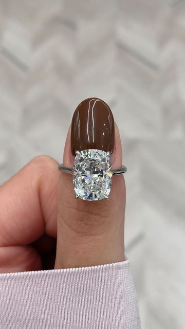 Lauren B on Instagram: "Back with another guessing game! Think you know the carat weight of this gorgeous elongated cushion diamond solitaire ring? ⬇️ #laurenbjewelry #cushiondiamond #elongateddiamond #bigdiamondring #cushionengagementring" 3ct Elongated Cushion Engagement Ring, Elongated Cushion Engagement Ring, Big Diamond Rings, Diamond Engagement Rings Cushion, Elongated Cushion Cut, Elongated Cushion, Cushion Engagement Ring, Diamond Solitaire Ring, Engagement Rings Platinum