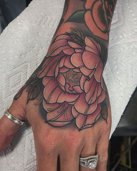 Pretty peony for @therealjessicajan 💖 next to some Doney work 🔥 done here at @envisiontattoo #handtattoo #peonytattoo #prettypeony… Peony Flower Hand Tattoo, Hand Tattoo Female, Peony Hand Tattoo, 2024 Tattoo, Peony Tattoo, Tattoo Female, Purple Peonies, Peonies Tattoo, Hand Tattoo