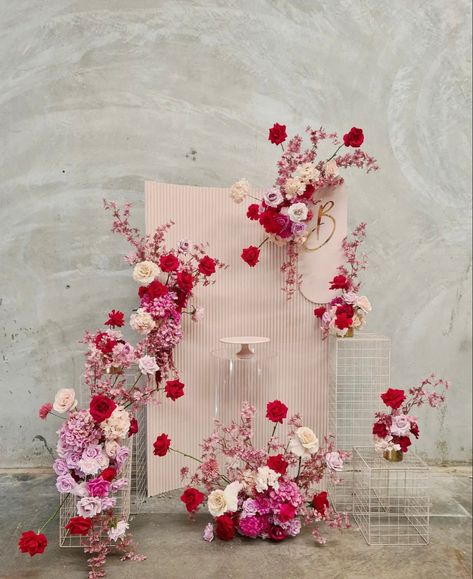 Viva Magenta Flower Arrangement, Red Pink Lavender Wedding, Red Pink Wedding Backdrop, Pink Red Wedding Decor, Hot Pink Wedding Florals, Pink And Red Backdrop, Pink Floral Installation, Pink And Red Florals, Red Pink Flower Arrangements