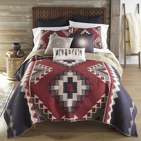 The Mojave red 3pc quilt set from your lifestyle by donna sharp is designed with a large-scale pattern based on a traditional southwest woven pattern. Colors include charcoal, camel, warm tan, and brick red. The lining is a tan ticking stripe. Easy care machine washable, 100% polyester fabric. All accessories sold separately. # Pieces In Set: 3Included: 2 King Sham(s), 1 Quilt(s)Features: QuiltedBedding Thread Count: 140Quilt Style: PrintedWarmth Factor: MidweightBed Size: KingFill Weight: 6 1/2 Southwest Bedding, Southwest Quilts, Dec Pillows, Western Bedroom, King Quilt Sets, Red Quilts, Inspire Me Home Decor, King Bedding Sets, Decor Pillows