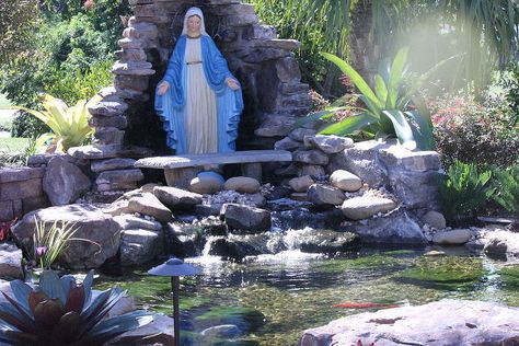 If you already have a water feature on your property, you could make it even more beautiful by adding a grotto. Mary Grotto Garden, Mary Grotto, Catholic Garden, Small Water Feature, Marian Garden, Grotto Design, Mary Garden, Blessed Mother Statue, Sacred Garden