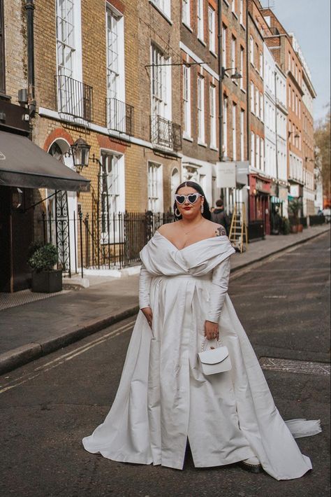 Brunette plus sized bride wears an off the shoulder ivory wedding dress with full skirts and white cats eye sunglasses Plus Sized Woman, Plus Size Brides, Plus Size Bride, Curvy Bride, Wedding Vision, Big Bust, Plus Sized, Cap Dress, Planning A Wedding