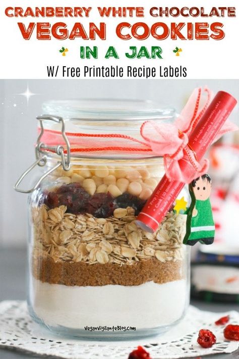 Looking for vegan cookies in a jar to give family & friends this holiday? These Cranberry White Chocolate Vegan Cookies in a Jar are easy to make & the perfect DIY Christmas gift. Vegan Christmas cookies in a jar come with free printable labels that include instructions on how to make the recipe. Festive, creative & tasty, too! #vegancookiesinajar #vegancookiesinajargift #freeprintablelabels #veganmasonjarcookies #veganchristmascookiesinajar #easy #vegancookiesinajarrecipe Christmas Cookies In A Jar, Cookies In A Jar, Vegan Christmas Cookies, Cranberry White Chocolate, Healthy Vegan Dinner Recipes, White Chocolate Cranberry Cookies, Mason Jar Cookies, Vegan White Chocolate, White Chocolate Cookies