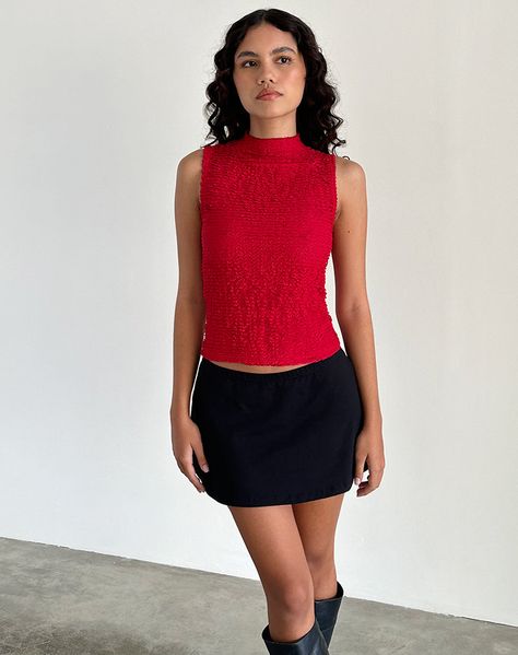 Our Arien top, in a textured red fabric features a mock neck and sleeveless design with a regular hem. Styled with our Cinta skirt for the perfect fit. MODEL WEARS SIZE:EXTRA SMALL - MODEL HEIGHT:5'7 Red High Neck Top Outfit, Red Top Outfit Party, High Neck Top Outfit, Mock Neck Top Outfit, Red Top Outfit, High Neck Shirts, Chiffon Romper, Zebra Dress, Sleeveless Outfit