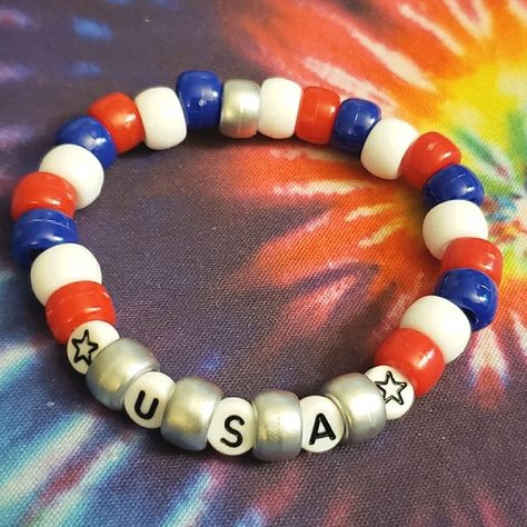 Hand Crafted Jewelry | Beaded Red White Blue Usa Kandi Bracelet | Color: Blue/Red/White | Size: Os 🌟 #EDCKnifeBeads #KnifeAccessories #EverydayCarry #EDC #GearCustomization #TacticalBeads #ParacordBeads #HandcraftedBeads #ArtisanBeads #KnifeCollecting #KnifeEnthusiast #GearUpgrade #UniqueBeads #FunctionalArt Skater Bracelets, 4th Of July Bracelets, Rave Bracelets, Bracelets Hippie, Patriotic America, Red Jasper Bracelet, Diy Kandi Bracelets, Letter Bead Bracelets, Pony Bead Bracelets