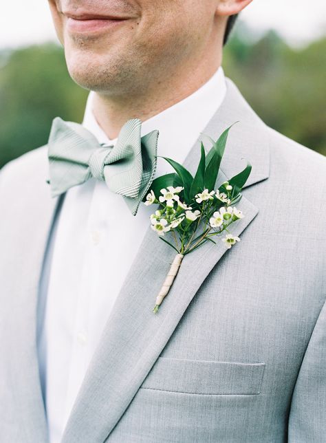 Grey suit and green and white boutonnière | Photography: Natalie Watson Photography Wedding Suits Men Grey, Sage Green Tie, Groomsmen Grey, Grey Suit Wedding, Groom Bowtie, Green Bow Tie, Groom Ties, Wedding Suits Groom, Boutonniere Wedding