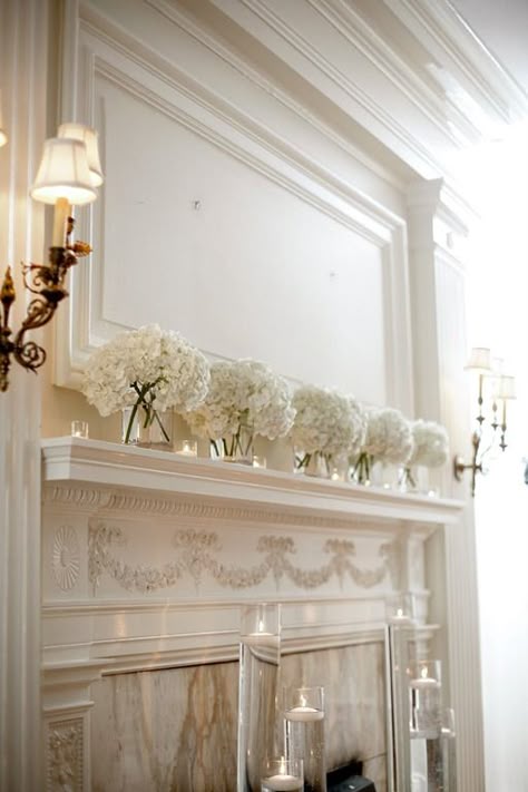 Simple and elegant white hydrangea mantle decor Hydrangea Wedding Decor, Fireplace Wedding, Wedding Mantle, White Hydrangea Wedding, Wedding Fireplace, Fun Wedding Decor, Candle Wedding Decor, Hydrangeas Wedding, White Wedding Flowers