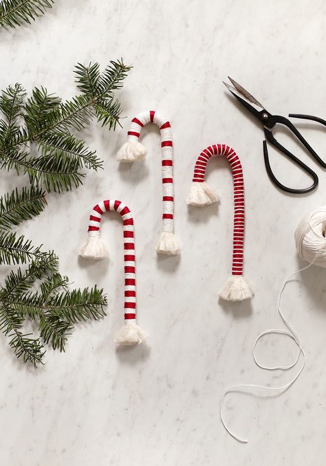 The Merrythought Diy Candy Canes Decorations, Candy Cane Diy Decorations, Diy Candy Cane Decorations, Diy Candy Cane Ornaments, Macrame Candy Cane, Scandinavian Holiday Decor, Candy Cane Decorations, Christmas Entryway, Gingerbread Diy