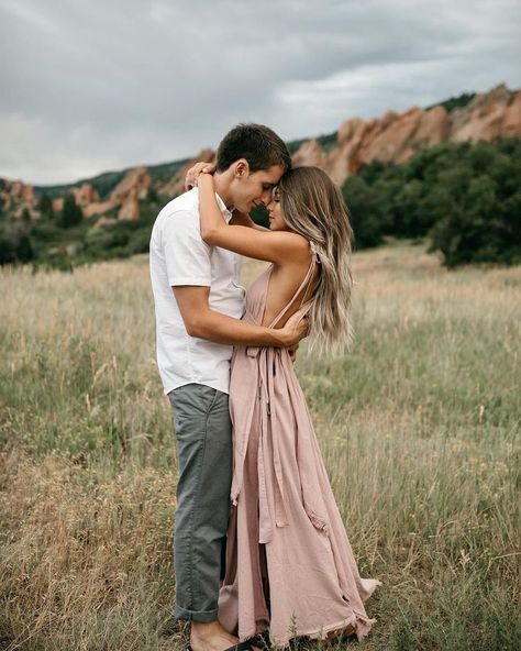 love her pink blush dress! Engagement Photo Mountains, Outdoorsy Engagement Photos, Engagement Photos Woods, Farm Engagement Pictures, Poses For Engagement Pictures, Engagement Photo Dresses, Engagement Photos Mountains, Engagement Shoot Outfit Ideas, Engagement Photo Shoot Outfits