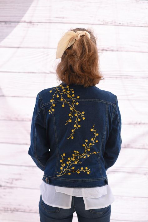 Size small. Upcycled. Dark wash denim. Fairly stretchy, fitted style. Bright Gold sparkly Embroidery. Measurements are seam to seam/edge and button center-button hole under the arm seam: Shoulder width: 15.5” Back length: 21” Sleeve length: 23” Chest: 40.5” Diy Denim Jacket Embroidery, Embroidery Designs On Jacket, Denim Vest Embroidery, Embroidery Designs Denim Jacket, Denim Embroidery Ideas, Denim Embroidery Jacket, Jean Jacket Embroidery Diy, Jean Jacket Embroidery Ideas, Embroidery On Denim Jackets