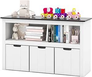 About this item ✔LARGE CAPACITY STORAGE- This kids storage cabinet has plenty of storage for your little one's belongings. Featuring spacious tabletop, large open shelf and 3 deep drawers, your children can place their favorite toys in a place, such as balls, toy cars, building blocks and others. ✔BLACKBOARD TOP & WHEELED DRAWERS- The blackboard top not only provides storage space for items, but also allows for writing and drawing. It is worth mentioning that all the drawers can be used separat Wooden Toy Storage Ideas, Nursery Toys Storage, Small Toy Storage Ideas, Toddler Toy Storage Ideas, Child Friendly Living Room, Bookshelf For Nursery, Living Room Toy Storage Ideas, Kids Storage Ideas, Toddler Bookshelf