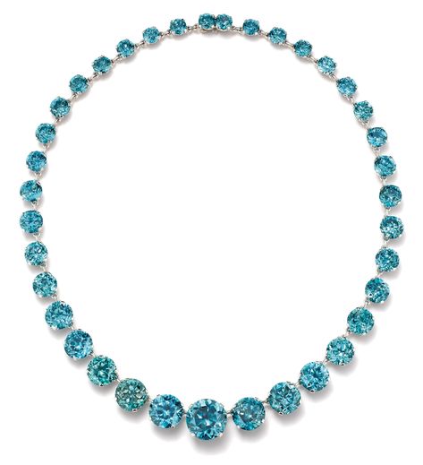 37 electric blue zircons totaling 169.20 carats, center stone 18.94 carats, in platinum, approximately 17.50 inches Platinum Necklace, 9 December, Mabe Pearl, Zircon Jewelry, Cz Jewelry, Gold Brooches, Diamonds And Gold, Blue Zircon, Art Deco Diamond