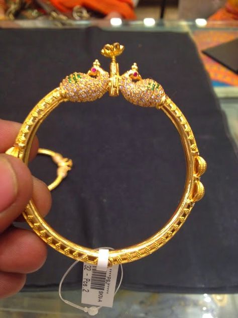 peacock kada Kadiyam Bangles For Women, Kankanam Bangles Gold, Kada Designs Gold For Women Antique, Kada Bangles Gold Design, Gold Kada Design For Women, Pearl Bangles Gold, Latest Jewellery Designs, Gold Peacock, Gold Bangles For Women