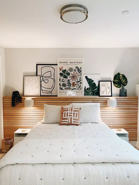 Art Gallery Wall Bedroom, Northwest Interior Design, Wood Slat Headboard, Wood Slat Accent Wall, Slat Accent Wall, Above Bed Ideas, Bed With Drawers Underneath, Wall Behind Bed, Slat Headboard