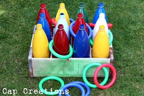 ring toss. spray paint the inside of the bottles. Let dry for 24 hours. weight by filling with sand. Diy Ring Toss, Carnival Party Games, Diy Carnival Games, Homemade Carnival Games, Carnival Games For Kids, Diy Party Games, Kids Ring, Diy Carnival, Backyard Summer