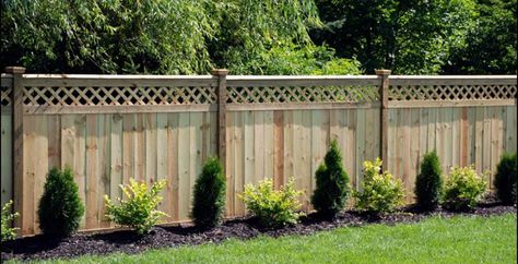 55 Lattice Fence Design Ideas (Pictures of Popular Types) Here are our best lattice fence design ideas. A lattice fence can offer privacy, security and help your backyard look more inviting to family and friends. Looking for a way to enclose your yard but hate the restrictive feel of tall privacy enclosures? Do you want security within your property but feel that stockade style fences are too plain for your landscape? Then lattice fences may be the right fence style for you. Below we share a v Fence With Lattice Top, Privacy Fence Landscaping, Fence Design Ideas, Wood Privacy Fence, Privacy Fence Designs, Lattice Fence, Backyard Privacy, Fence Styles, Diy Fence