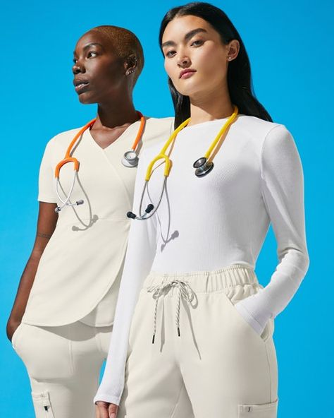 Women’s Performance Scrubs, Medical Apparel and Face Masks | Jaanuu Medical Scrubs Aesthetic, Jaanu Scrubs, Scrubs Photoshoot, Doctor Fashion, Medical Clothing, Tulip Top, Jaanuu Scrubs, White Scrubs, Medical Scrubs Fashion