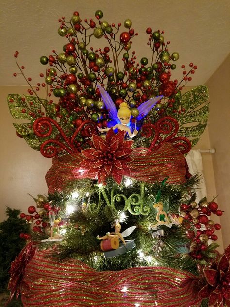 My Tinkerbell tree topper on my Disney tree 2016 Tinkerbell Christmas Tree, Tinkerbell Tree Topper, Tinkerbell Tree, Tinkerbell Christmas, Disney Tree, Green Christmas Tree Decorations, Burlap Christmas Tree, Burlap Christmas, Green Christmas Tree