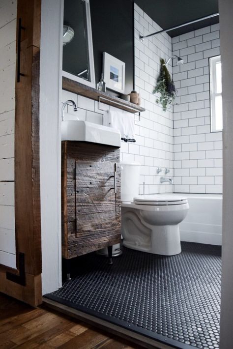 Matte black penny tile in a rustic modern bathroom. Penny Tiles Bathroom, Rustic Modern Bathroom, Half Bathroom Decor, Farmhouse Bathroom Remodel, Bathroom Vanity Decor, Farmhouse Small, Redecorating Ideas, Modern Bathroom Remodel, Farmhouse Bathroom Vanity