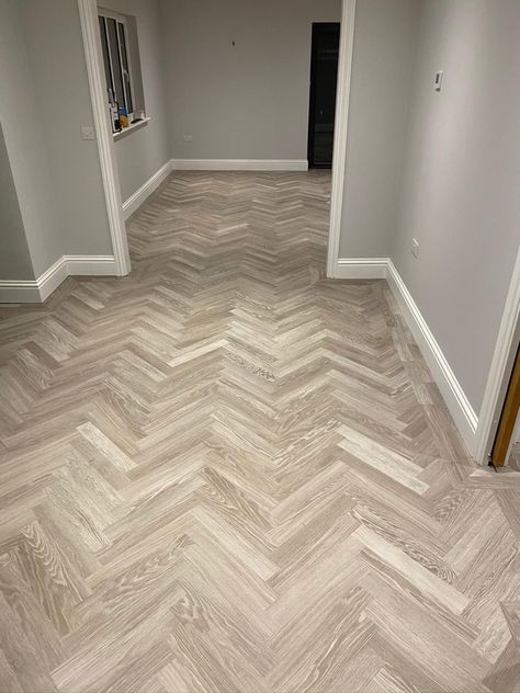 A Karndean Knight Luxury Vinyl Tile in grey limed oak colour. Herringbone design with a double plank boarder edge Small Bathroom Parquet Floor, Herringbone Karndean Flooring, Karndean Flooring Bathroom, Greige Herringbone Floor, Karndean Parquet Flooring, Karndean Flooring Living Room, Downstairs Flooring Ideas, Karndean Herringbone Flooring, Lvt Herringbone Flooring