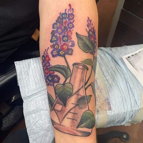 Lilacs and beaker tattoo. Done at Dark Heart in Crystal Lake IL. #tattoos #tattoo #beauty Beaker Tattoo, Tattoos 2022, Trending Tattoos, Prison Tattoos, R Tattoo, Dark Heart, Crystal Lake, Get A Tattoo, A Tattoo