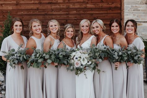 Bridal party with beige dresses and eucalyptus greenery bouquets.  KGC Photography Bridesmaids With Greenery Bouquets, Bridesmaid Bouquets With Eucalyptus, Wedding Flower Arrangements Bridesmaids, Bridesmaids Greenery Bouquet, All Greenery Bouquet Bridesmaid, Wedding Bouquets Bride Greenery, Eucaplytus Wedding Bouquet, Wedding Party Flowers Bouquets, Bridal Party No Bouquets