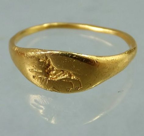 Ancient Roman gold ring with engraved wolf Ancient Gold Ring, Mouse Ring, Mickey Mouse Ring, Ancient Roman Jewelry, Ancient Jewels, Gold Finger Rings, Roman Jewelry, Ancient Jewellery, Stop Dreaming