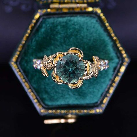 clio-https://clio.giliarto.com/ring/1/985 Round Emerald Engagement Ring, Engagement Rings Floral, Teal Sapphire Engagement Ring, Teal Rings, Floral Halo, Floral Engagement Ring, Dream Engagement, Jewelry Accessories Ideas, Dream Engagement Rings