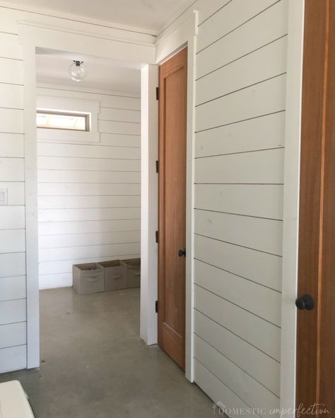 Five tips and tricks for painting shiplap! #shiplap #painting #farmhouse #accentwall #whiteplankwall #DIY #plankwall #cottage #mudroom #DIYshiplapwall #paintingtips White Wall White Trim, Vertical Painted Shiplap, Vertical Vs Horizontal Shiplap, Barn Door Against White Shiplap, Shiplap Projects, Shiplap Home, Cottage Mudroom, How To Install Vertical Shiplap, White Plank Walls