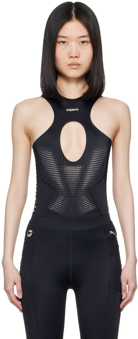 Stretch recycled nylon jersey bodysuit. Reflective detailing, rubberized dots, and bonded seams throughout. · Crewneck · Bonded logo and cutout at chest · Reflective logo at shoulders · Press-stud closure at bottom · Anti-slip trim at inner cuffs · Laser-cutouts at back Part of the Coperni x PUMA collaboration. Supplier color: Black Edgy Activewear, Sports Uniform Design, Activewear Logo, Laser Logo, Designer Sportswear, Laser Cutout, Black Puma, Shoulder Press, Cutout Bodysuit