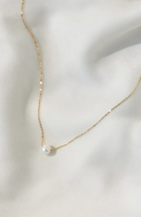 A single freshwater pearl makes a simple yet stunning statement on this delicate chain necklace. 16" length Pearl size: 8mm 14k-gold fill/freshwater pearl Made in the USA Jewelry Necklace Simple, Simple Pearl Necklace, Peacock Pearl, Gold Necklace Simple, Simple Pearl, Gold Pearl Necklace, Freshwater Pearl Necklace, Hair Accessories Jewelry, Freshwater Pearl Necklaces