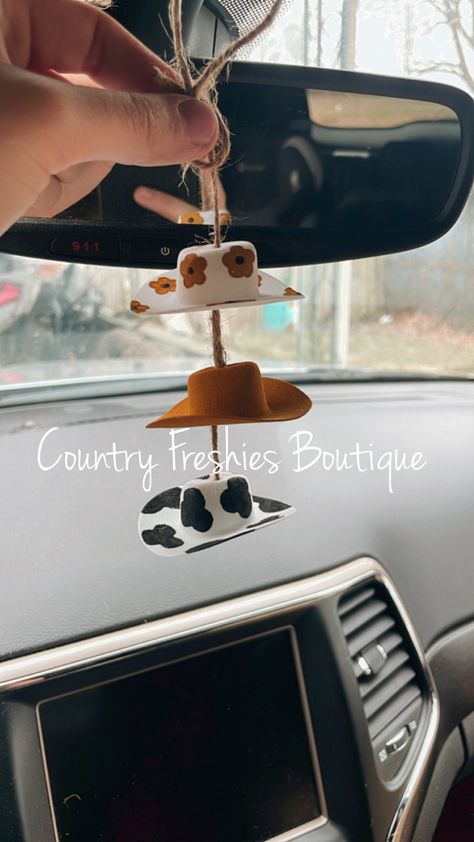 Car Cowboy Hat, Car Decor Theme Ideas, Car Inspo Interior Preppy, Cowboy Hat Rearview Mirror, Cowboy Hat Car Accessory, Car Decor Western, Cute Car Excessories, Granola Girl Car Decor, Fun Car Decor