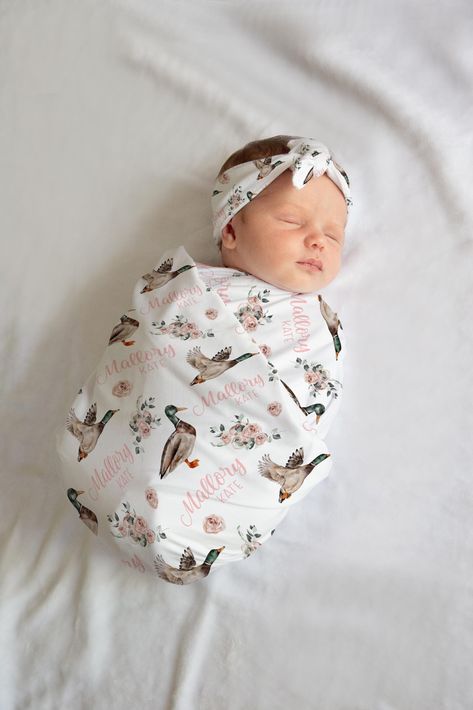 "The Little Blue Lion® personalized swaddle sets and blanket sets are the absolute perfect gift for any beautiful newborn baby!  Enjoy FREE shipping on orders $35 and more! Blanket Details: -Jersey Swaddle: 30x40 Color: White -Minky Blanket: 30x40 Color: White -Sherpa Blanket: 30x40 Color: White with Cream Sherpa back and hemmed edging. -Blankets are 100% Polyester -CPSC Compliant Larger Blanket sizes are available if desired in 40x50, 40x60, 50x60 or 60x80. Please message us for a blanket upgrade listing to add-on.  Beanie Hat: Hat will have pattern design inside and outside of hat and will have first name only on the front brim. Size: 0-6 months. Headband: Headband will have matching pattern on both sides.  22\" Long Headband will come untied. - Please Note: All blankets may have a sligh Baby Girl Duck Nursery, Girl Duck Nursery, Duck Baby Nursery, Duck Hunting Nursery, Duck Nursery, Hunting Baby, Personalized Swaddle Blanket, Baby Blanket Personalized, Personalized Swaddle