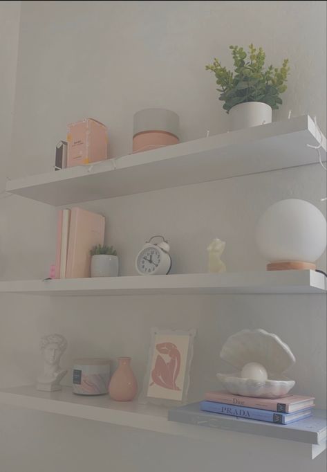 Self Decor Ideas Bedroom, Aesthetic Things To Put On Shelves, Pastel Floating Shelf, Decorating Ideas For Shelves In Bedroom, Shelf Decor Bedroom Pink, Bedroom Shelf Decor Aesthetic, How To Decorate Floating Shelves Bedroom, Aesthetic Shelf Decor Bedroom, Room Decor For Shelves