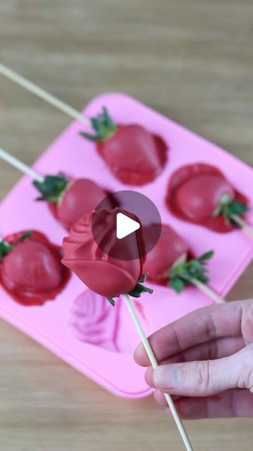 Sheri Wilson on Instagram: "I’ve seen this trend circulating and thought it was so clever!🌹Chocolate covered strawberries, but roses! Would you try these? Ingredients -Ghirardelli white chocolate wafers -colourmill red food coloring (oil based) -strawberries, washed and dried -small rose mold Melt your chocolate wafers in the microwave for 30 second bursts until fully melted. Add an oil based red or pink food coloring to your chocolate, then mix until fully incorporated. Press a skewer into each strawberry, then place on a paper towel to wick any moisture before dipping. Pour a small amount of chocolate into your mold, then place a dipped strawberry into each cavity. Place into the fridge to set for 5-10 minutes. Enjoy the same day as prepared. #valentines #treats #valentinesday Chocolate Rose Strawberries, Rose Chocolate Strawberries, Rose Strawberries Chocolate, Chocolate Covered Rose Strawberries, Easy Chocolate Dipped Strawberries, Red Dipped Strawberries, Strawberry Desserts Chocolate, Chocolate Strawberry Roses, Chocolate Covered Strawberries With Rose