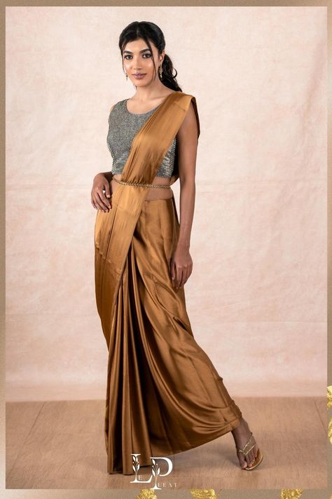 "Fashions fade, style is eternal." —Yves Saint Laurent Brown Satin Saree, Blouse Styling, Satin Sarees, Brown Saree, Saree Fancy, Glitter Blouse, Shimmer Blouse, Golden Saree, Sarees For Women