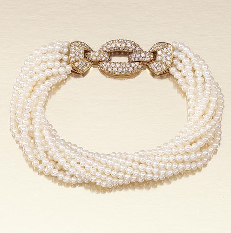 SEED PEARL AND DIAMOND TORSADE BRACELET, CARTIER.  Composed of eleven rows of seed pearls, centring on a buckle clasp set with brilliant-cut diamonds, length approximately 200mm, signed Cartier Paris, numbered, French asssy marks. Cartier Earrings, Cultured Pearl Bracelet, Art Jewelry Design, Pearl Jewels, Gold Girl, Diamond Jewelry Necklace, Diamond Bangle, Jewelry Design Necklace, Vintage Jewellery