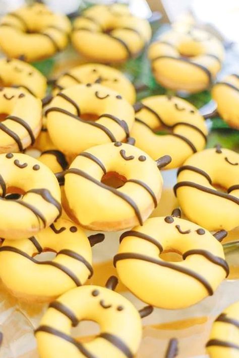 Take a look at this beautiful bumblebee birthday party! The bee donuts are adorable!  See more party ideas and share yours at CatchMyParty.com  #catchmyparty #partyideas #bumblebees #bumblebbeparty #donuts Bumblebee Birthday Party, Donut Party Ideas, Bee Birthday Theme, Bee Themed Gender Reveal, Bee Themed Birthday Party, Donut Decorating Ideas, Bee Food, Bumble Bee Birthday, Kreative Snacks