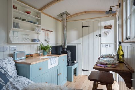 Shepherd's Hut Interiors: 21 Amazing Designs You've Got To See Shepherds Hut For Sale, Small Wood Burning Stove, Shepherds Huts, Shepherd Hut, Shepherd Huts, Fold Down Table, Outdoor Tables And Chairs, Shepherds Hut, Shed Homes