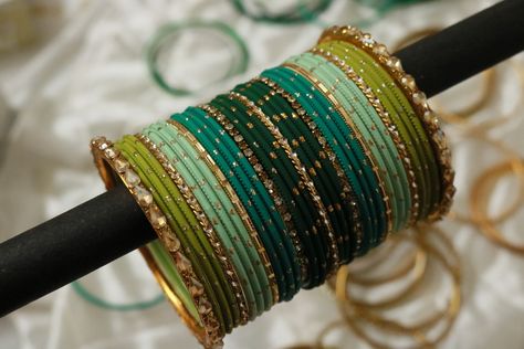 Follow us on Instagram- @studio_kalai Bangle Setting Ideas, Bangles Setting Ideas, Luxury Green Bangle, Bangles Combination, Green Bangles Set, Green Pallet, Green Bangles, Wedding Jewelry Sets Bridal Jewellery, Thread Bangles Design