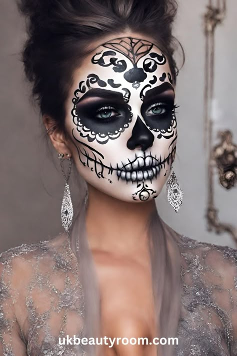 Sugar skull makeup is a colorful and artistic face painting style inspired by the Mexican holiday, Día de los Muertos (Day of the Dead). It involves using bright colors, white and black paint to create designs on the face that resemble ornate sugar skulls. This post list 17 pretty sugar skull makeup ideas you can create at home. easy, pretty, tutorial, easy simple, for men, half, kids easy, DIY, for men with beards, half face, step by step Skull Faces Halloween, Easy Half Face Halloween Makeup, Women’s Halloween Face Paint Ideas, Jeweled Skull Makeup, Painted Skeleton Face, Skeleton Makeup Women Easy, Face Paint For Women Halloween, Witch Doctor Face Paint, Catrina Make Up Ideas