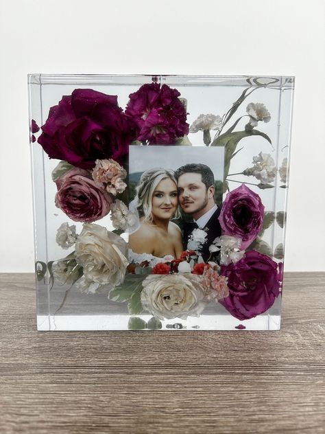 "Looking for a unique way to preserve your bridal bouquet? Look no further! SavedArrangements will preserve your special moments into timeless keepsakes!! This listing is for reserving your 2022-2023 spot for a custom resin Block using your bouquet!!  Whether the flowers are from a wedding, funeral or just because, we would be honored to create a work of art that YOU will be able to cherish for a lifetime! - HOW TO ORDER -  Due to demand, we ask you to select the time frame in which you will sen Wedding Flowers After The Wedding, Preserving Wedding Bouquet In Resin, Flowers In Resin Ideas, Preserve Bouquet Wedding, Epoxy Resin Wedding Bouquet, Wedding Bouqette Preservation, Resin Bridal Bouquet, How To Preserve Wedding Flowers, Saving Wedding Bouquet