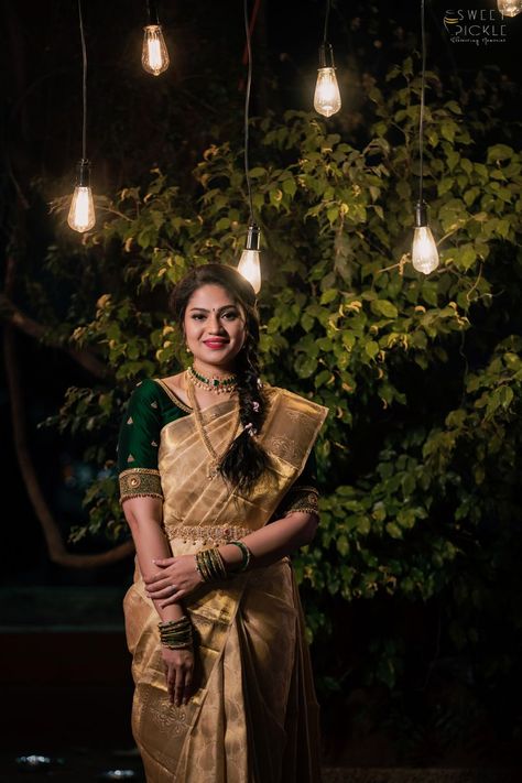 Photo of Bride wearing a gold saree with a bottle green blouse. Bottle Green Blouse, Green Velvet Blouse, Gold Saree Blouse, Bottle Green Saree, Green Blouse Designs, Photo Of Bride, Gold Saree, Engagement Saree, Indian Bride Makeup