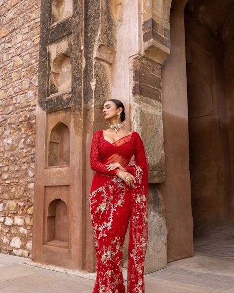 The adorable hearts ❤️ embroidered veil is 🤌🏼...... Red has never looked this good! We present to you a stunning red saree with gold and silver sequins highlights RIZWANA - Red tulle saree with sequins, crystals and buggle beads hand embroidery with gorgeous tassels in sleeves and pallu and that veil Cosmos: A Cocktail Affair Discover the collection: Online at Roujeofficial.com via link in bio Calcutta | Hyderabad Jewelry:@gkchudiwalas [ Roujeofficial, rouje, Cosmos, feathered cap... Beads Hand Embroidery, Red Saree Wedding, Reception Sarees, Embroidered Veil, Sequin Saree, Indian Wedding Outfit, Short Veil, Party Sarees, Red Saree